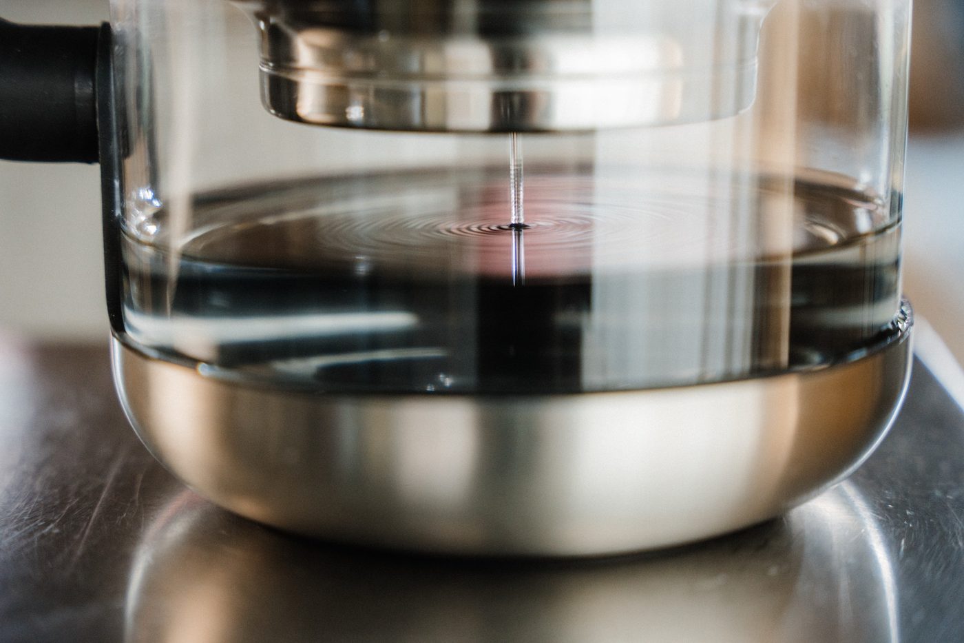 Close-up of the Rorra Pitcher stainless base and glass body